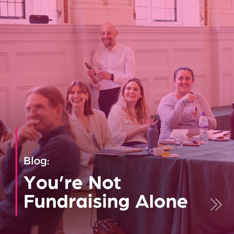 Group of people in a group training session stat at a table